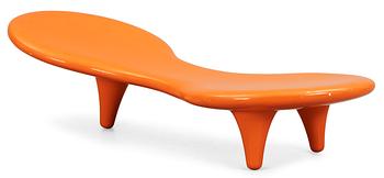 A Marc Newson orange glass fibre 'Orgone', Cappellini, Italy.