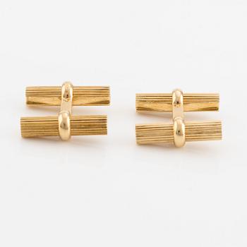 Van Cleef & Arpels, cufflinks with interchangeable parts in 18K gold and stone.