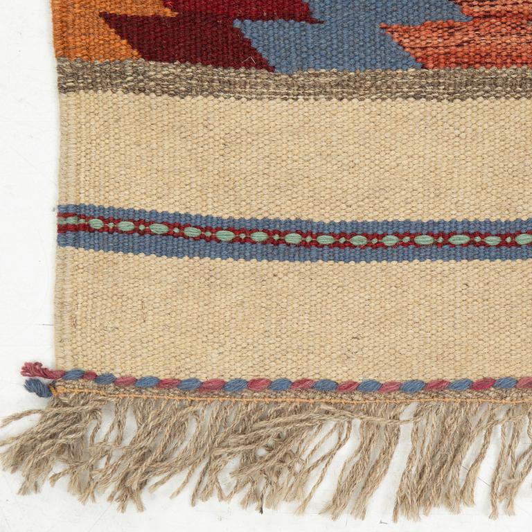 A persian kilim runner, c 246 x 64 cm.