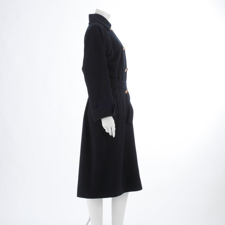 CÉLINE, a dark blue cashmere and wool coat.