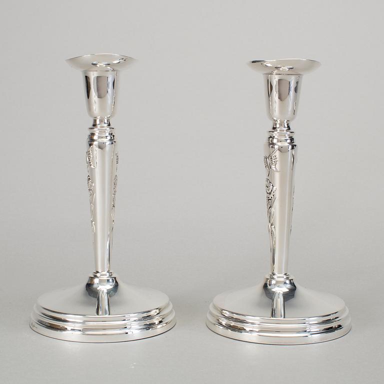 A pair of silver candlesticks by Meya Lerible for Mema, Linköping 1994.