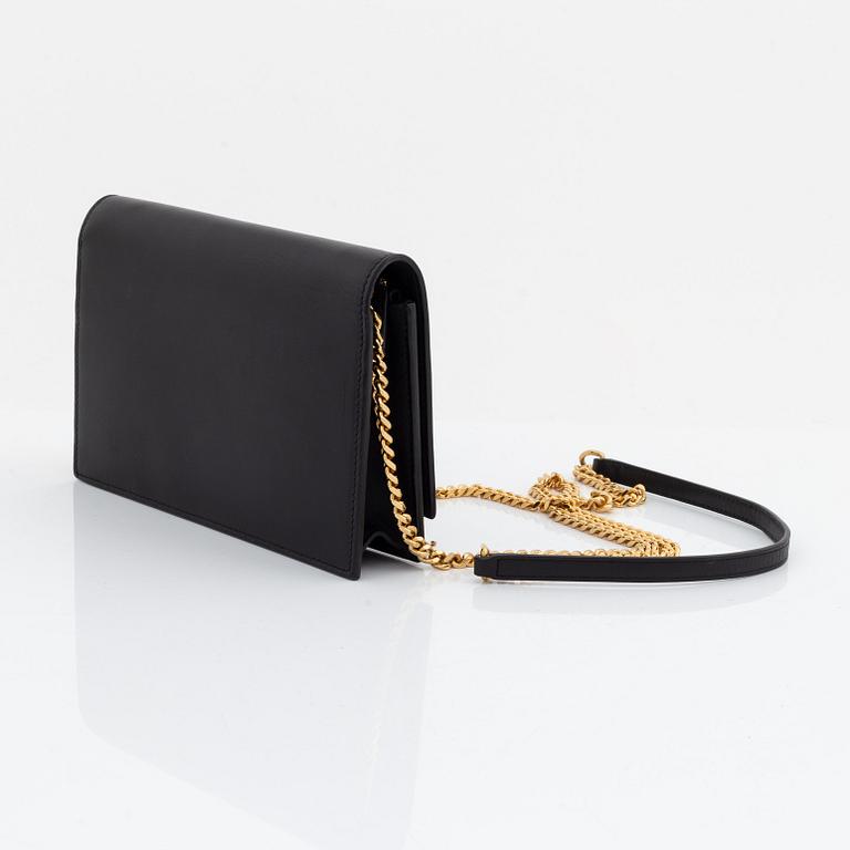 Yves Saint Laurent, a black leather 'Kate Medium' clutch,