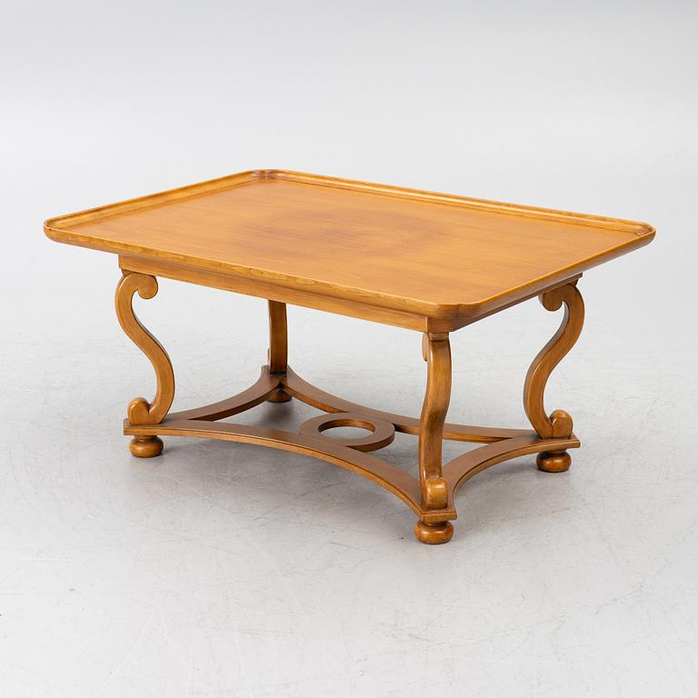 Coffee table, 20th century, with linked legs.