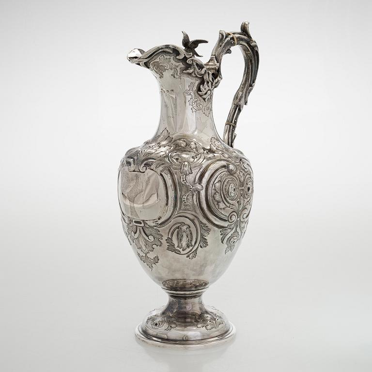 A sterling silver jug, maker's mark of Martin, Hall & Co, Sheffield 1877.
