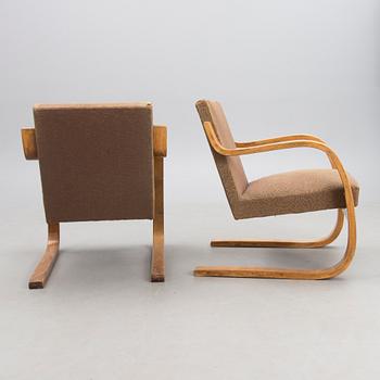 A PAIR OF 1940's ARMCHAIRS NO 34/402, Oy Huonekalu- ja Rakennustyötehdas Ab.