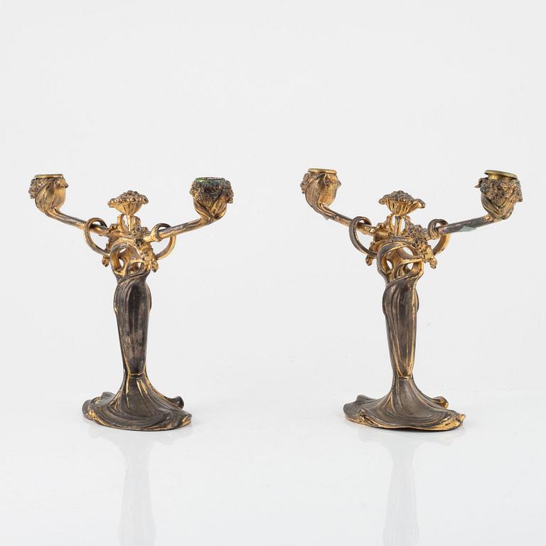 A pair Art Nouveau of gilt metal candelabra, early 20th century.