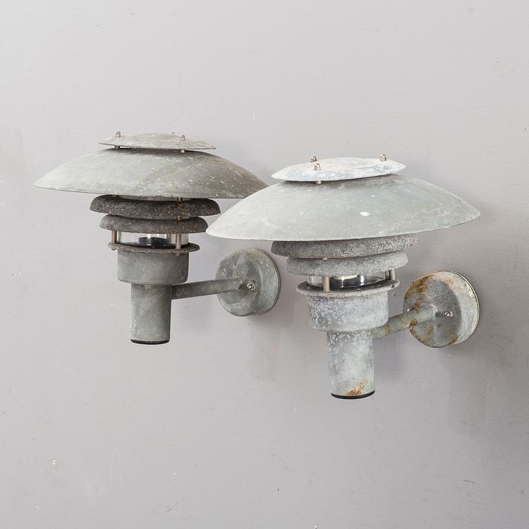 A pair of late 20th century outdoor lights.