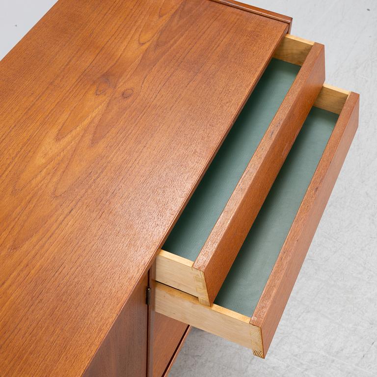 A teak veneered sideboard, mid 20th Century.