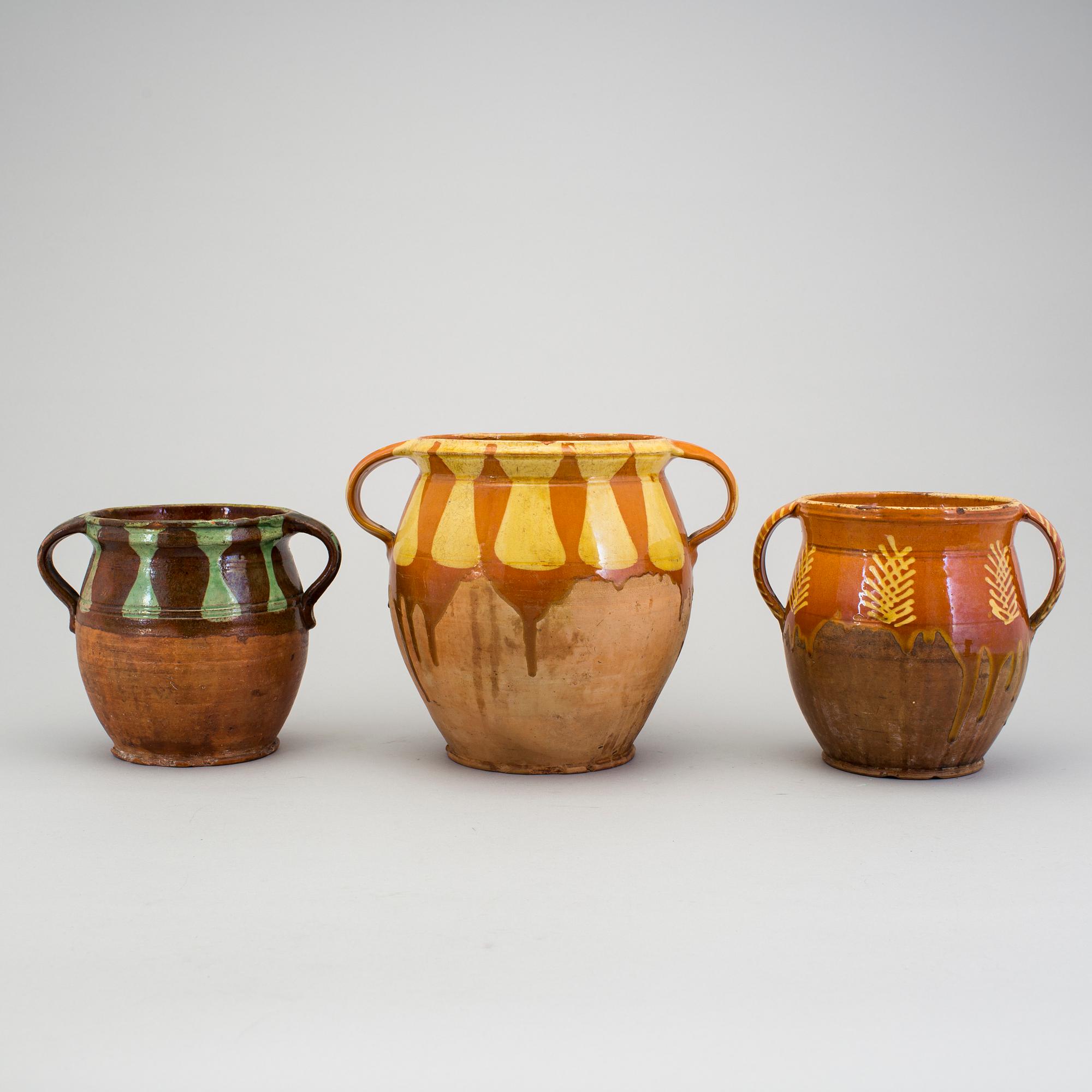 A lot of three folk art pottery jars 19th century.