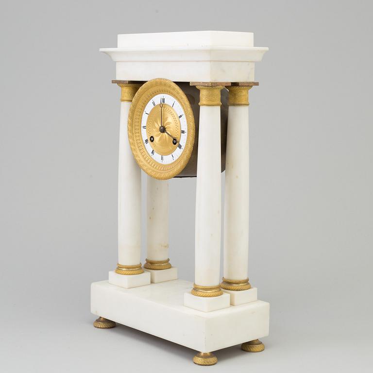 A french empire mantle clock, first half of the 19th century.