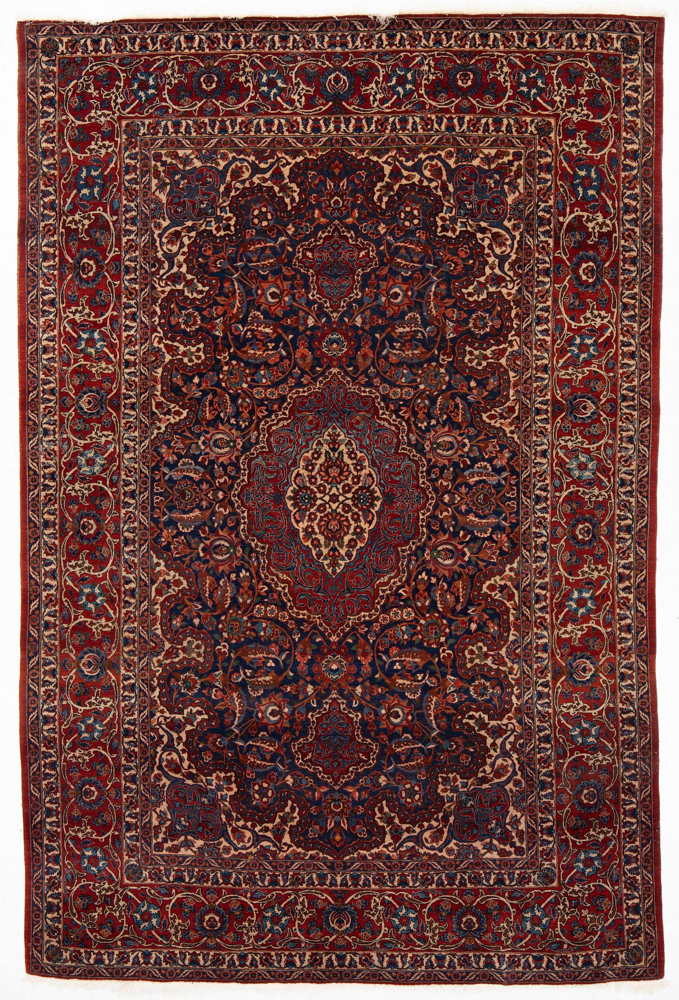 A semi-antique Isfahan rug, central Persia, c. 305 x 205 cm.