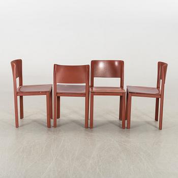 MATTEO GRASSI, a set of four leather chairs.