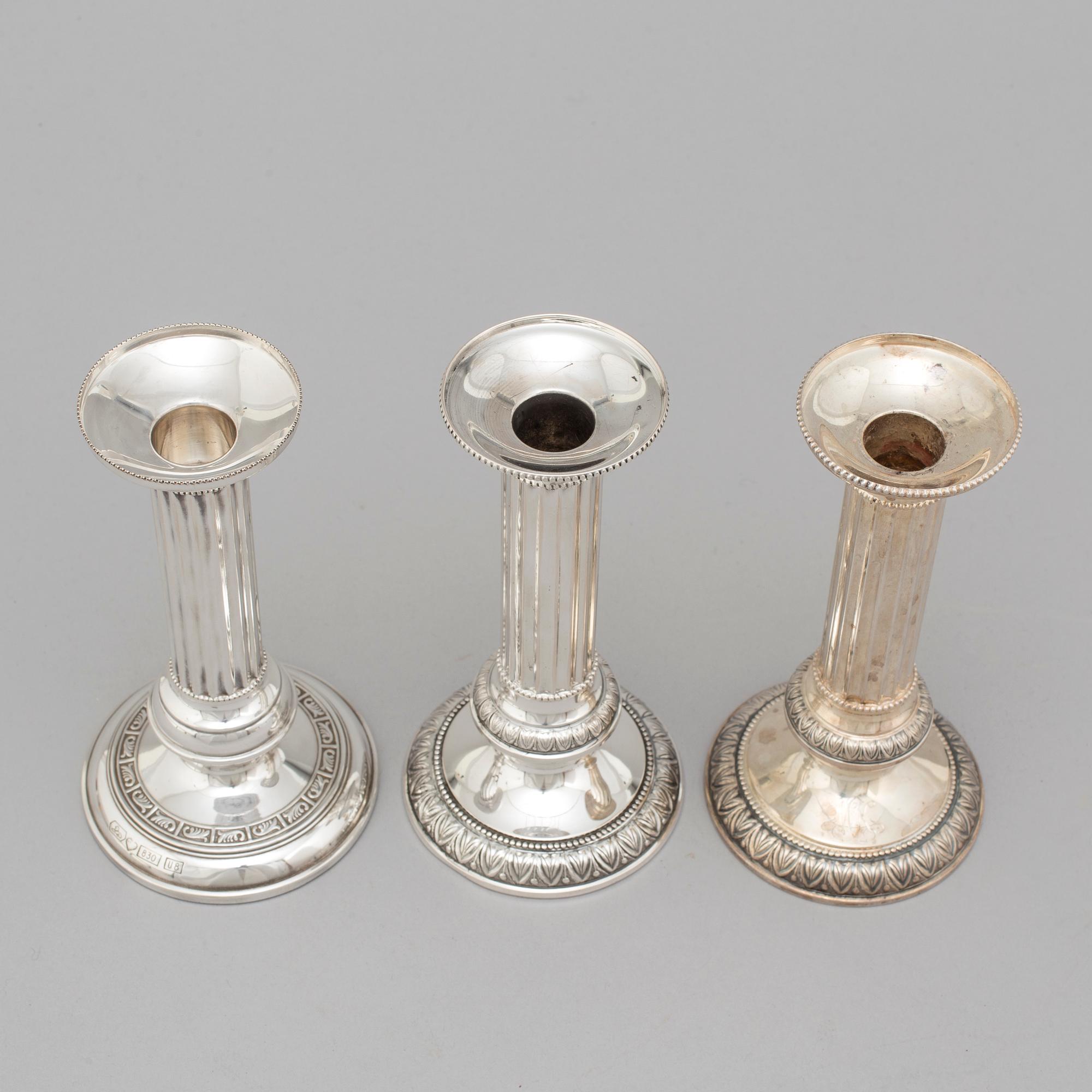 Three Finnish silver candlesticks, 1989-97.