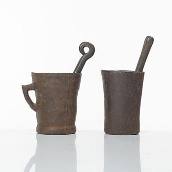 A set of two cast iron mortars, 17th / 18th century.