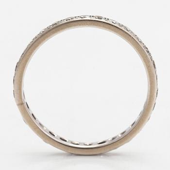 An 18K white gold eternity ring with brilliant-cut diamonds totalling approximately 0.60 ct.