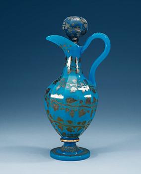 1214. A Russian turquoise glass ewer with stopper, 19th Century.