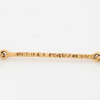 Hänge 18K guld med fasettslipad sten, H Engelbert, samt kedja.