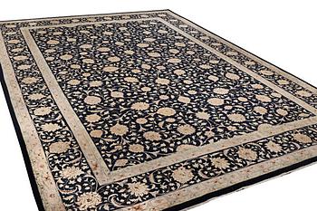 A carpet, Mashad, c. 548 x 383 cm.