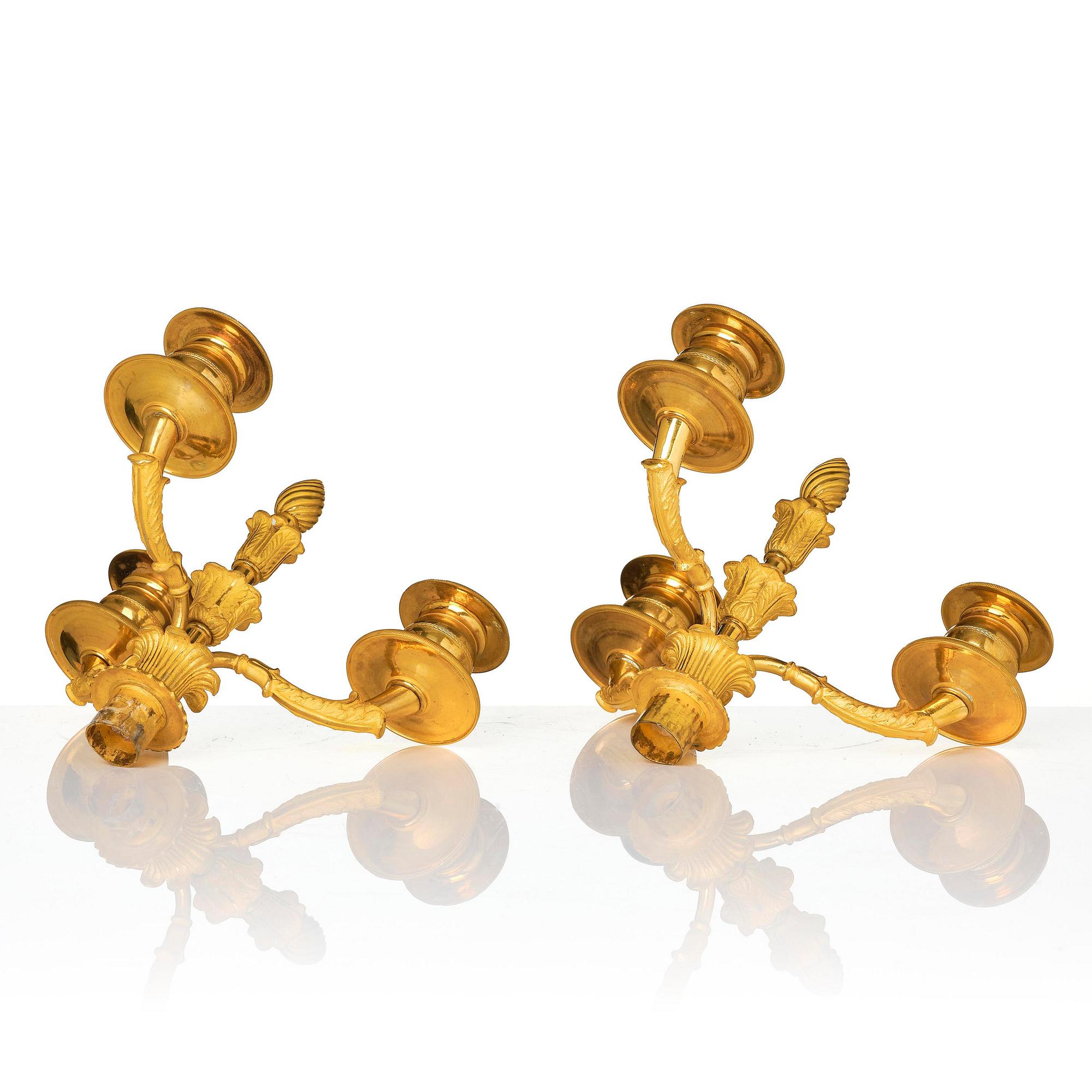 A pair of Empire ormolu three light Candelabra.