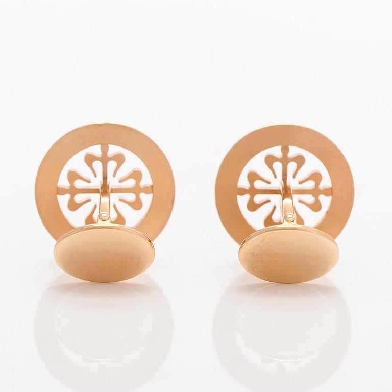 Patek Philippe, a pair of 18K gold "Calatrava" cufflinks.