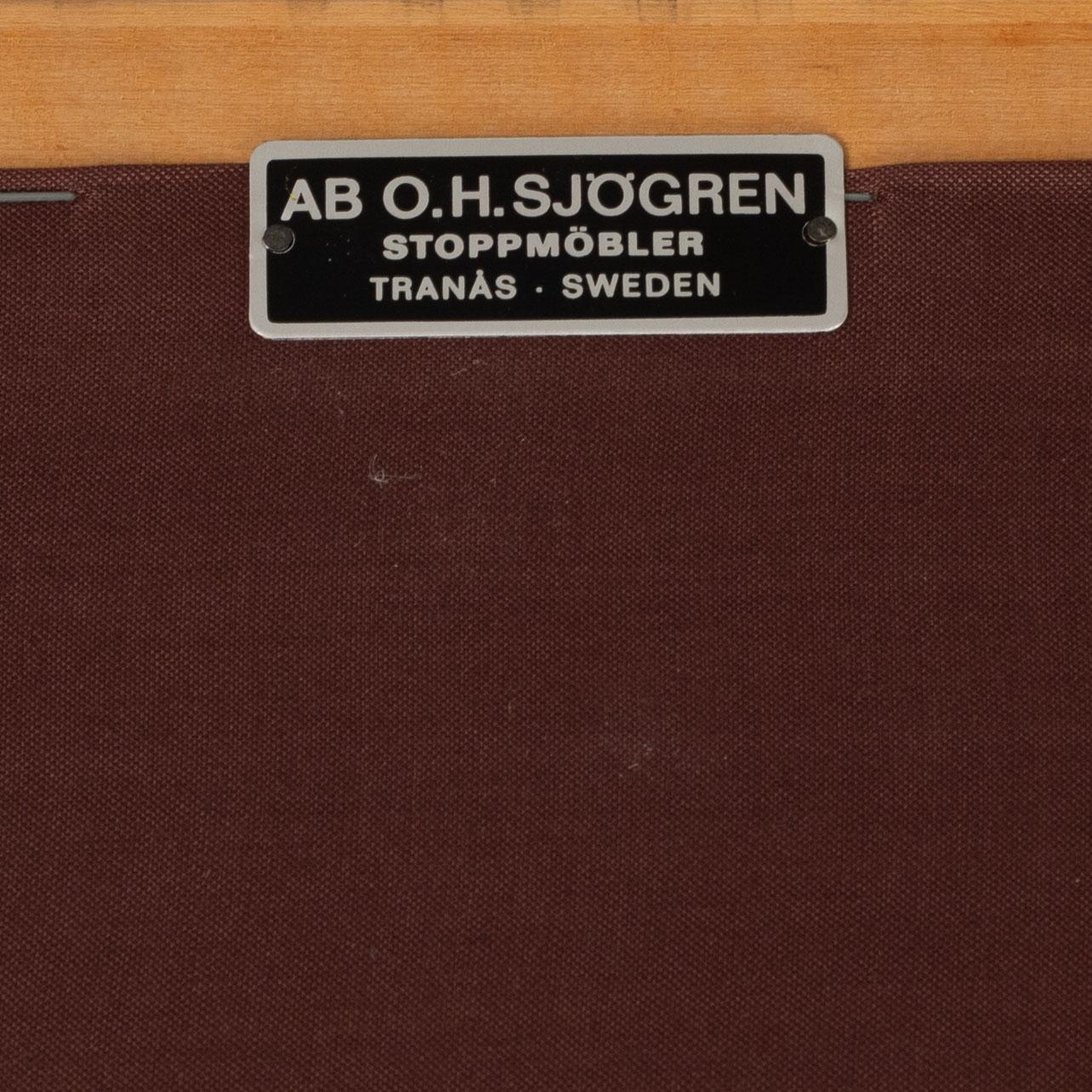Carl Malmsten, a 'Husfadern' armchair, Sweden, jubilee model 1988.