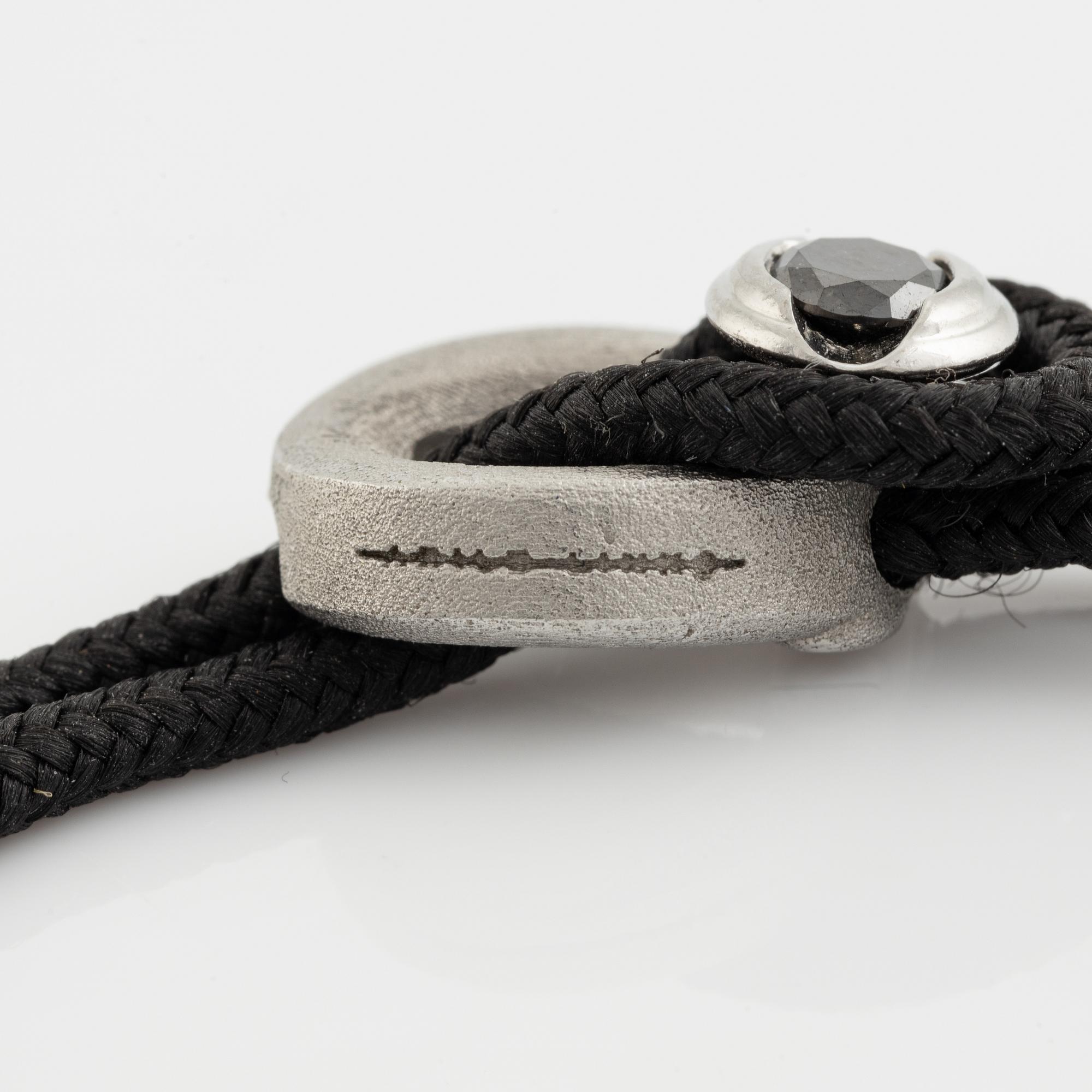 Håkan Orrling, Non Violence, bracelet with black diamond.