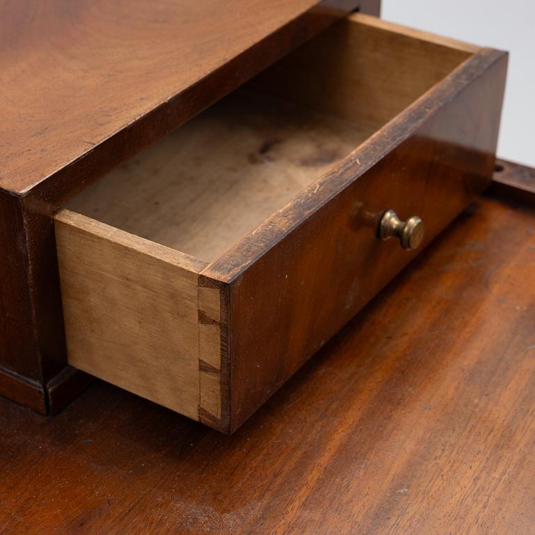 An Empire Dressing Table, first half of the 19th Century.