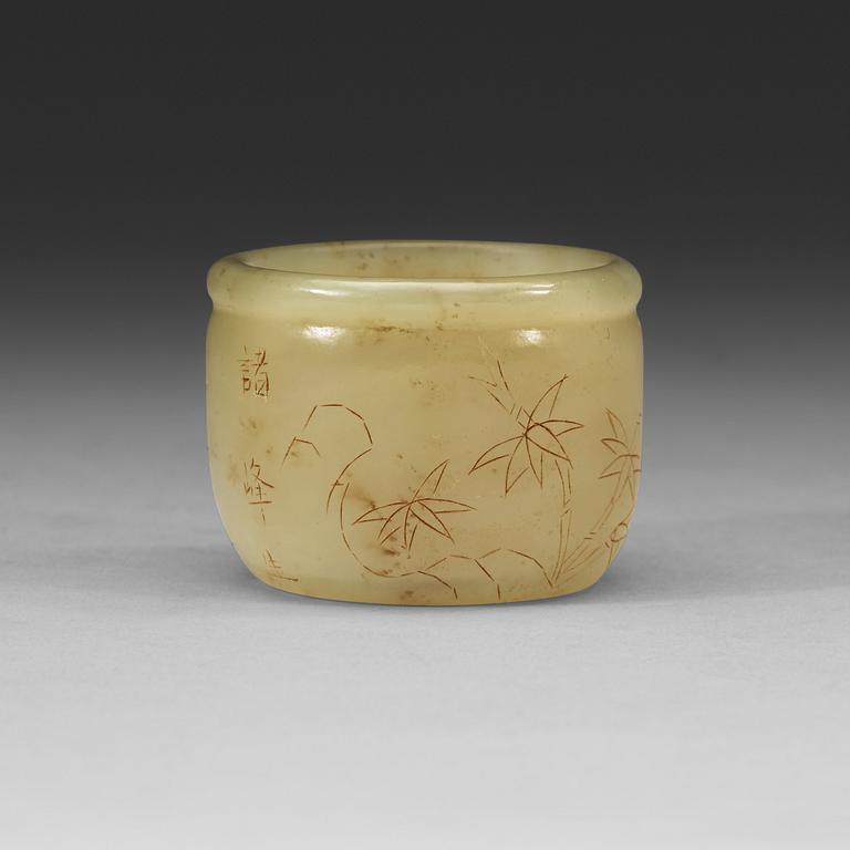 An engraved jade cup, Qing dynasty (1644-1912).