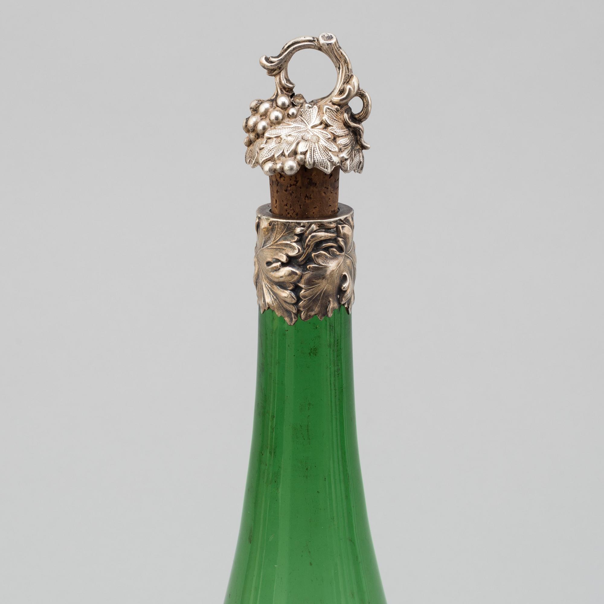 A silver mounted winebottle, Birmingham 1839.