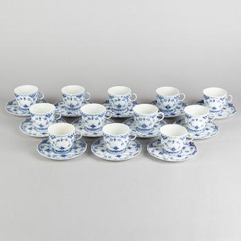 A set of twelve 'Blue Fluted Half Lace' porcelain coffe cups and stands, Royal Copenhagen, model 1035, 20th century.