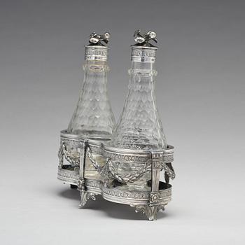 A Swedish 18th century silver and glass cruet-set, mark of Petter Eneroth, Stockholm 1780.