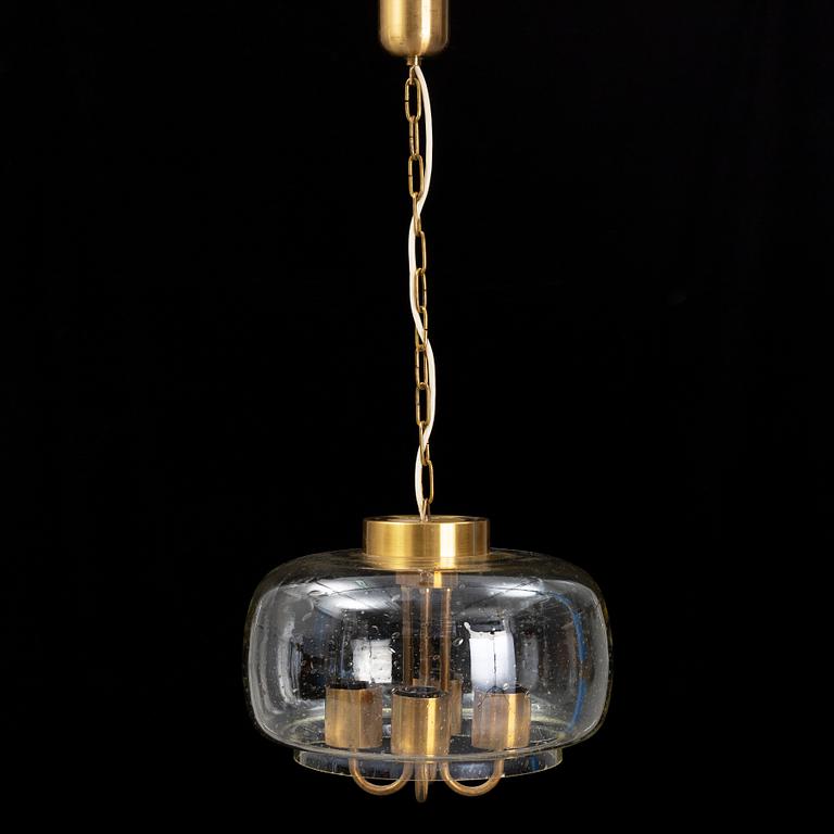 A 1960/70s glass and brass ceiling lamp.