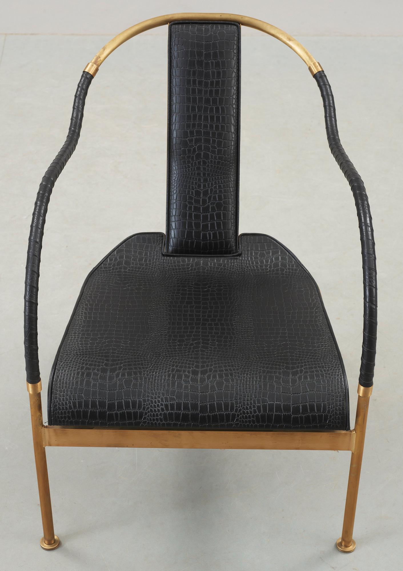A Mats Theselius 'El Rey' brass and leather easy chair, by Källemo, Sweden.