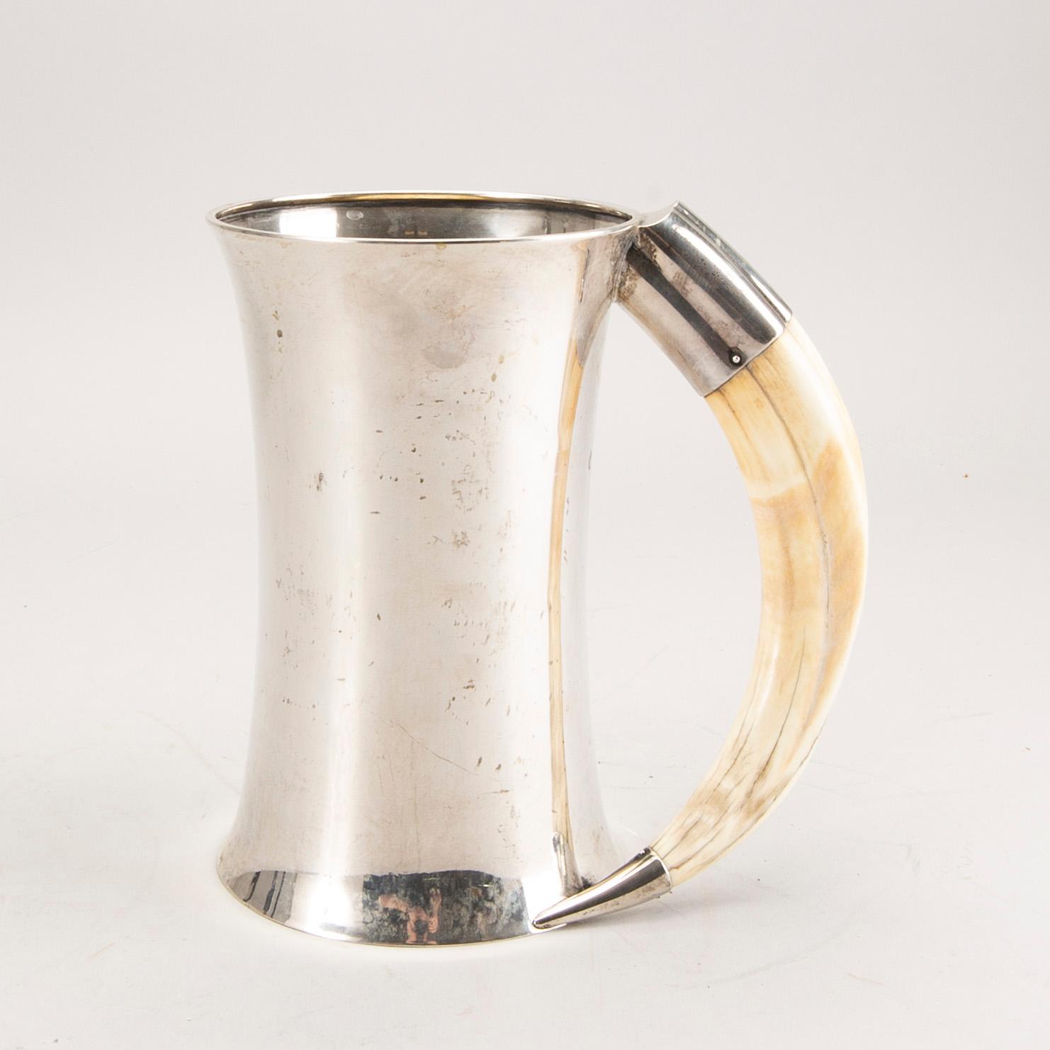 A Swedish 20th century silver and boar tusk tankard mark of CG Hallberg Stockholm 1915 weight 880 gr.
