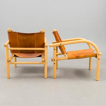 A pair of 1980s ' 411' armchairs for Artek, Finland.