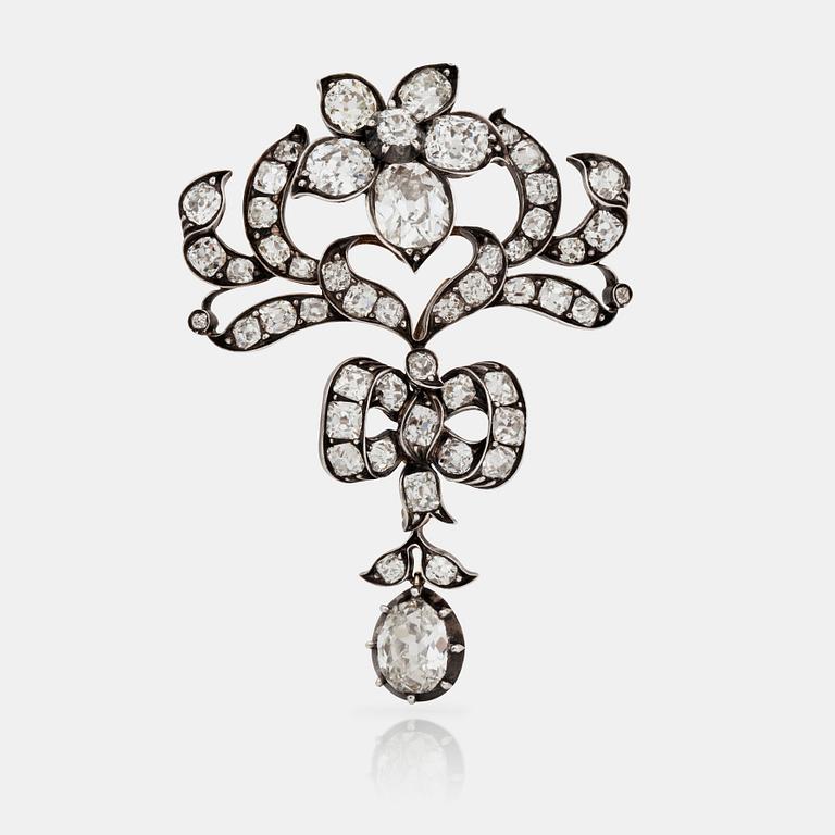 BROSCH/HÄNGE med gammalslipade diamanter totalt ca 16.00 ct.