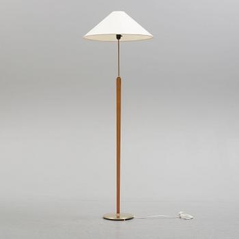 A Bergboms brass and beech standard light, 1940's.