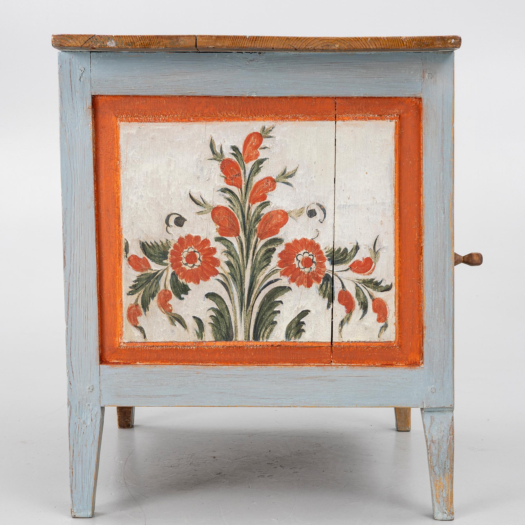A Swedish folk art polychrome-painted table from Järvsö, Hälsingland, dated 1834.