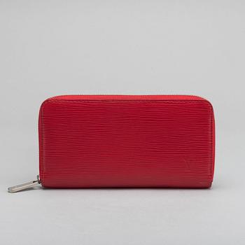 A Louis Vuitton zippy wallet.
