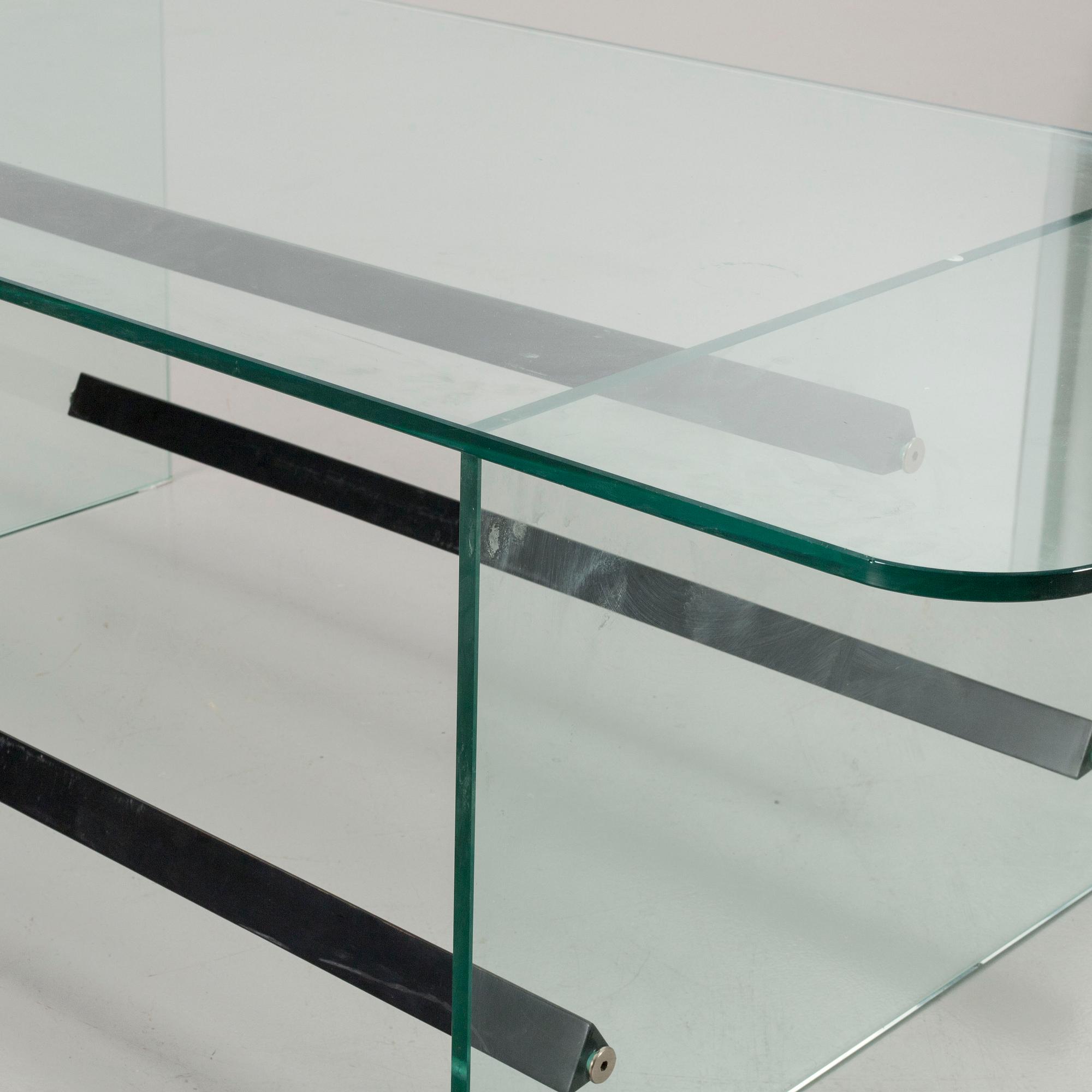 A late 20th century glass table.