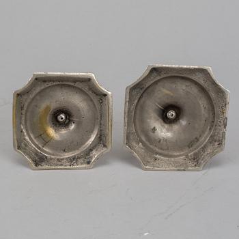 Two Swedish 18th century candlesticks.