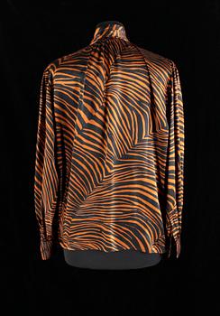 A set of two blouses by Yves Saint Laurent.