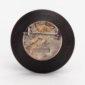 Kaija Aarikka, A necklace, a paid of earrings and a brooch made of silver and wood. Finland.