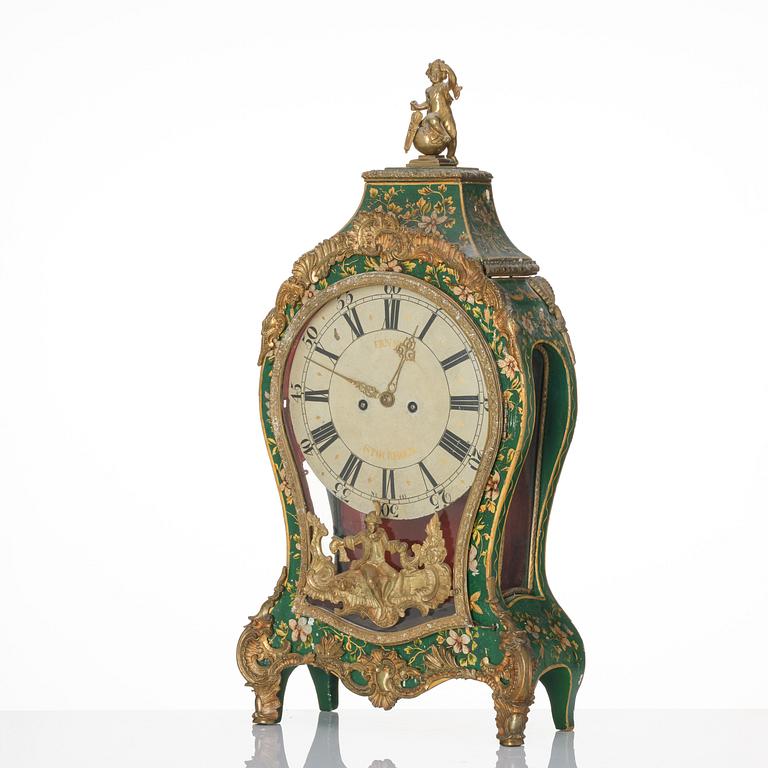 A rococo painted and gilt-brass mounted mantel clock by P. Ernst (watchmaker in Stockholm 1753-84).