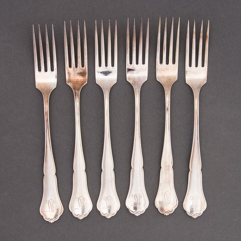 An 29-piece Chippendale silver cutlery set, Finnish hall marks, 1980s-90s.