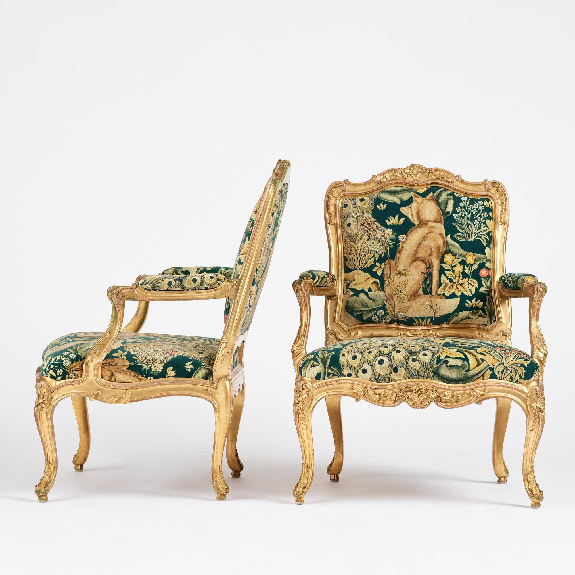 A pair of Louis XV-style giltwood fauteuils, late 19th century.
