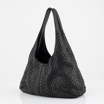 Bottega veneta, a black leather bag.