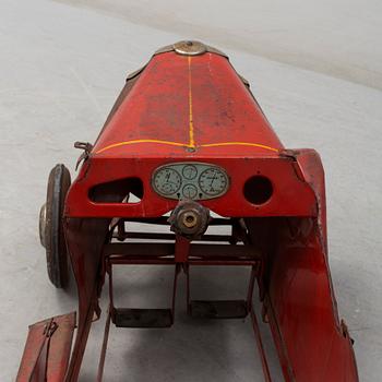 A mid 20th century gravity racer car.