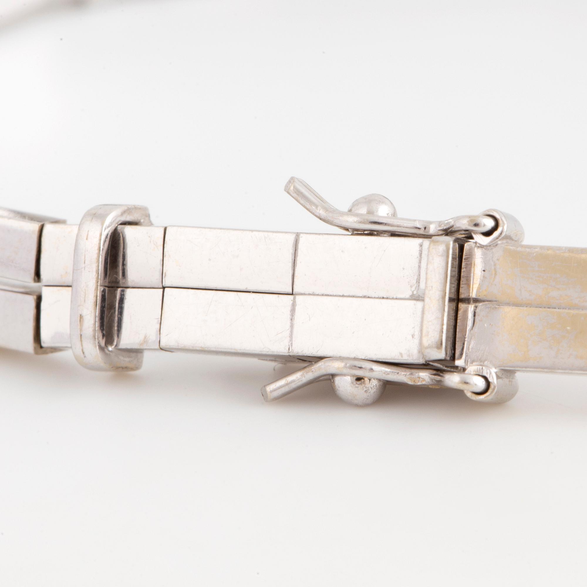 Armband 18K vitguld med runda briljantslipade diamanter.