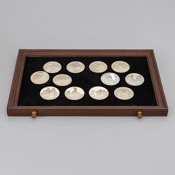 A set of 50 Sterling silver medals from Franklin Mint.